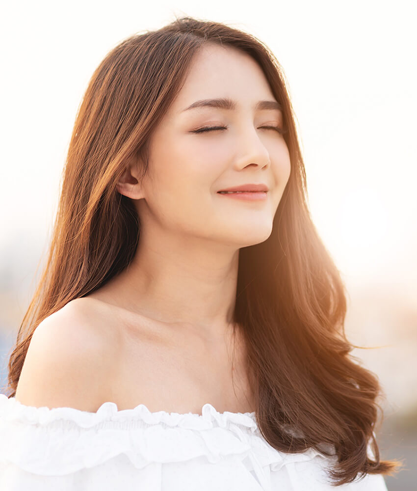 Asian woman in a crop top