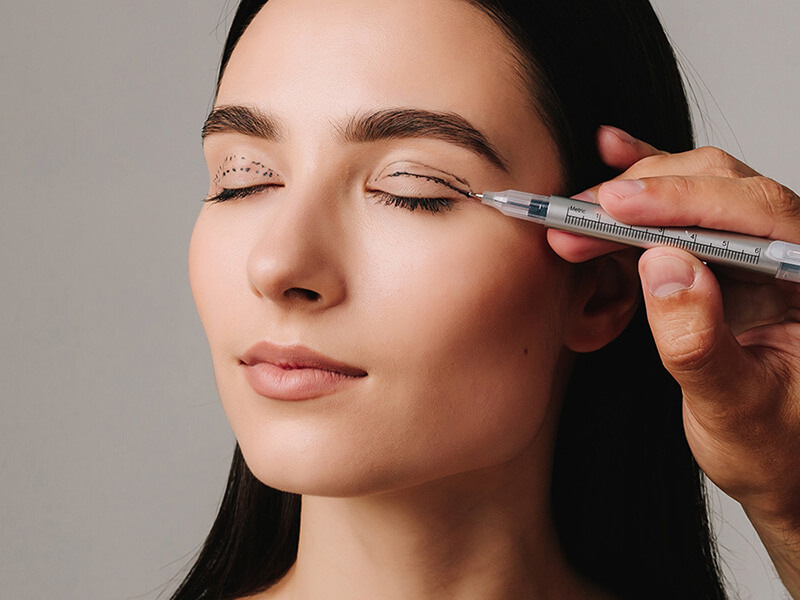 Woman getting an eye surgery done
