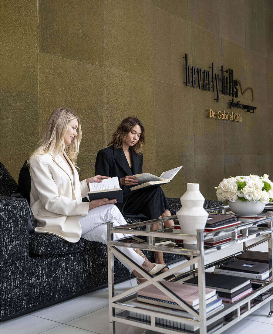 Patients waiting in the lobby reading magazines