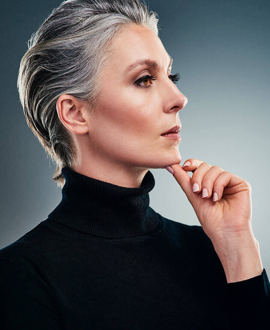 Mature woman in black turtle neck