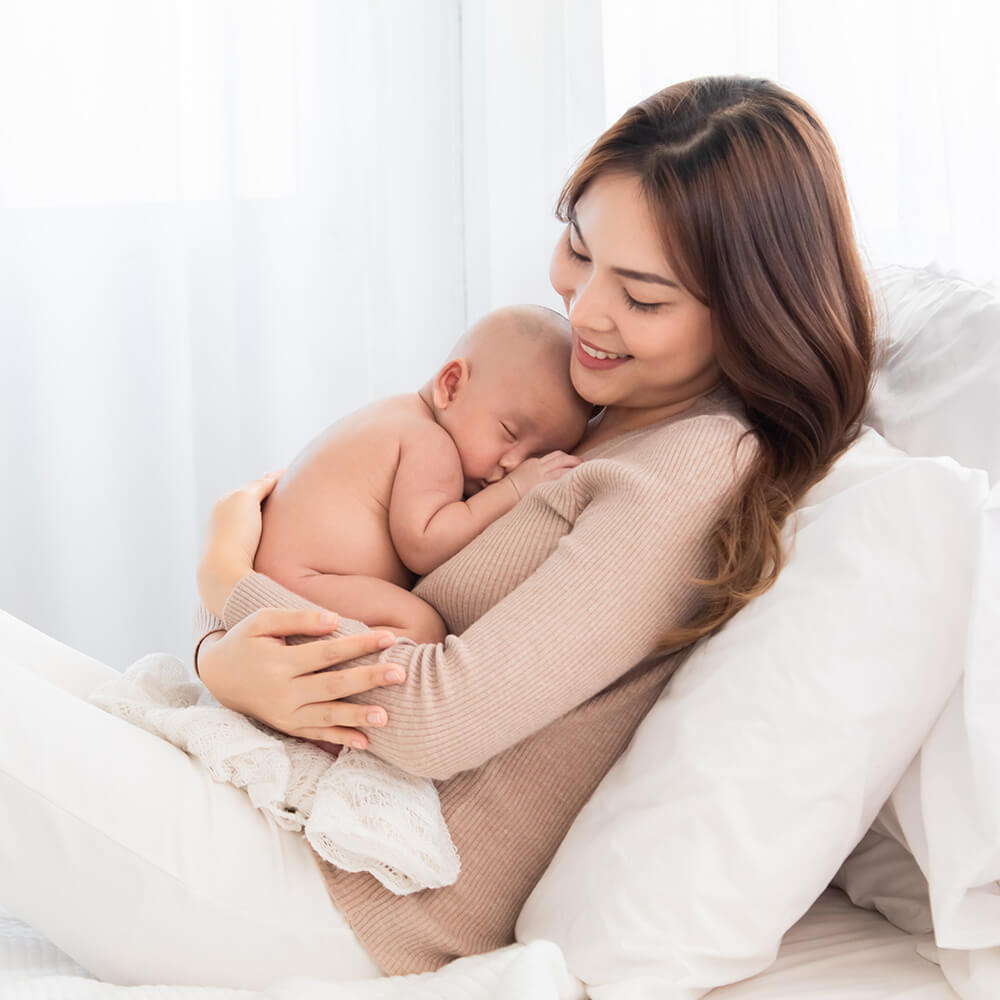 Woman holding a baby
