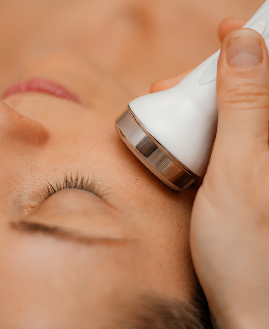Woman getting a face procedure done