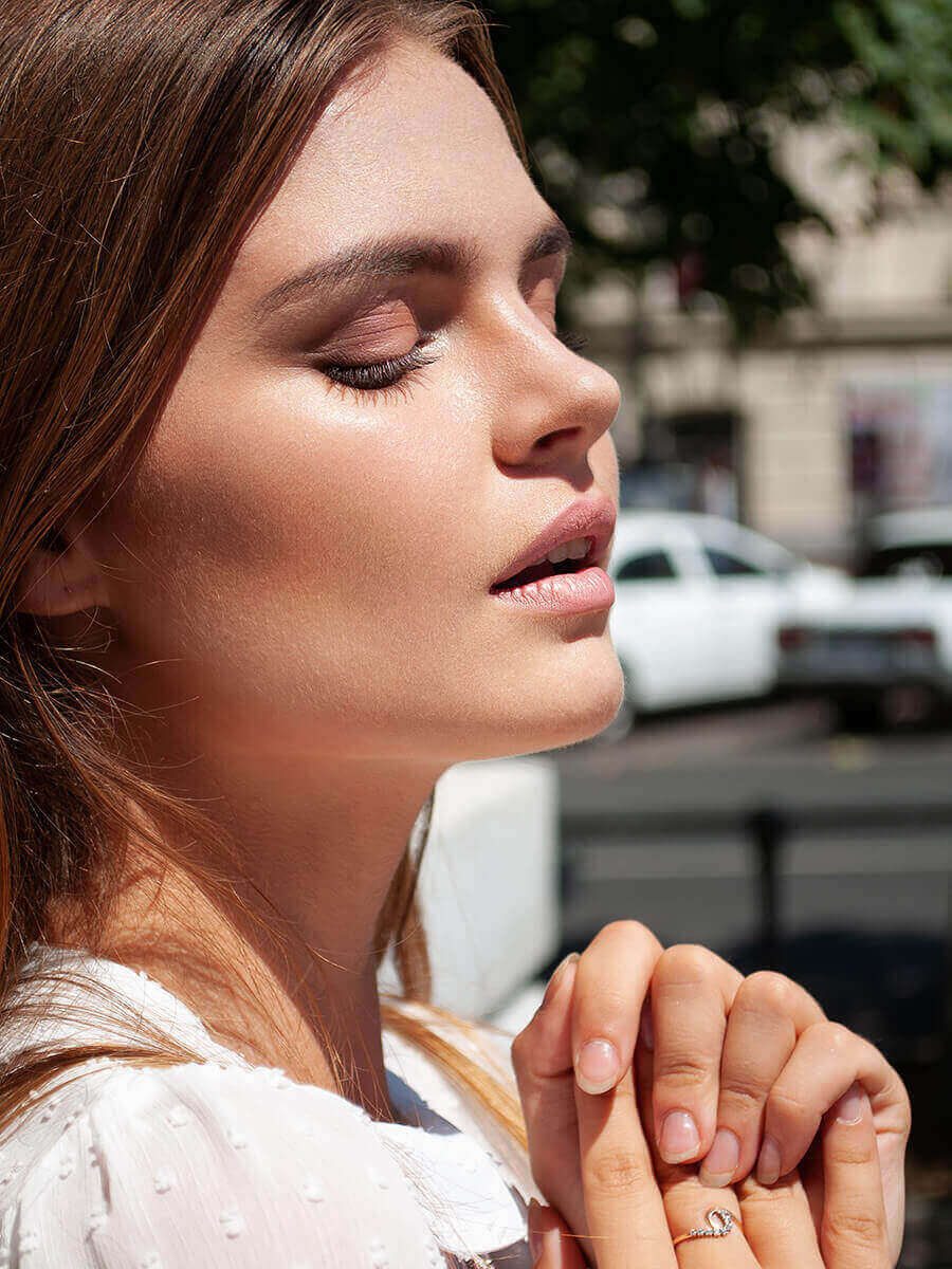 Young woman with her eyes closed