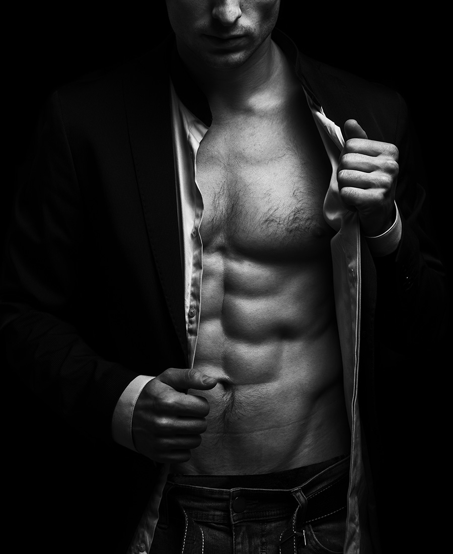 Fit man in a hooded sweater