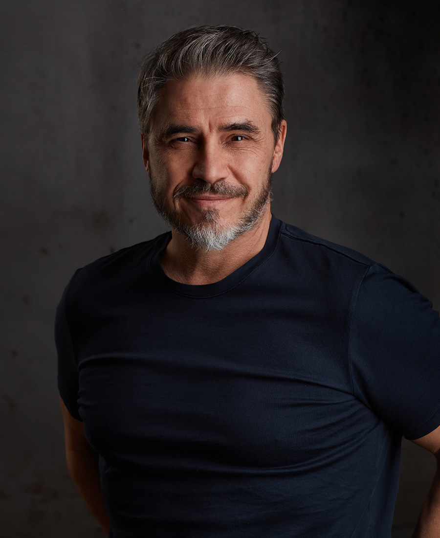 Mature man in a dark brown sweater